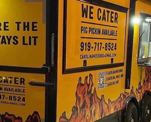 Carolina Moe's BBQ food truck at night